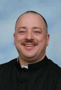 Rev. Wade De Coste